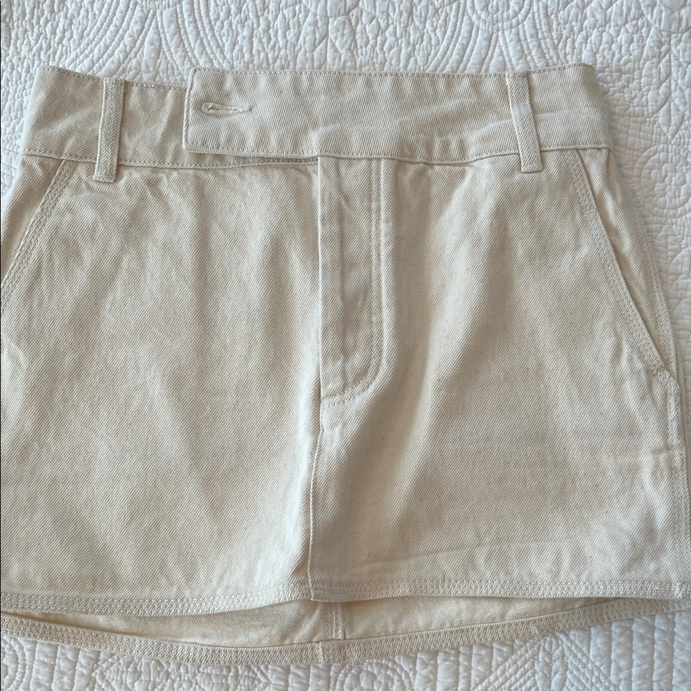 Helsa low-rise mini skirt in ecru denim.